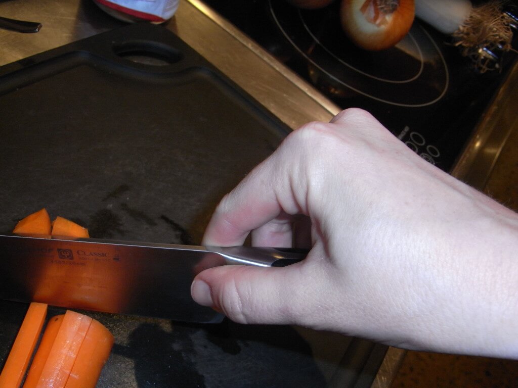 Pinch grip on the knife (a lot further forward than where I usually was cutting from)