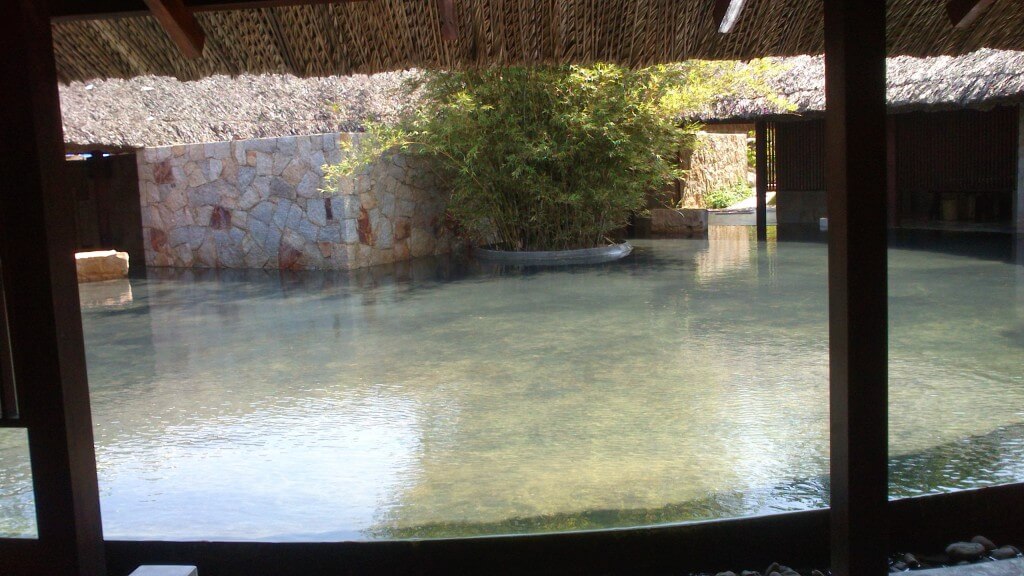 The reflective pool in the middle of the circular change rooms for the mud baths