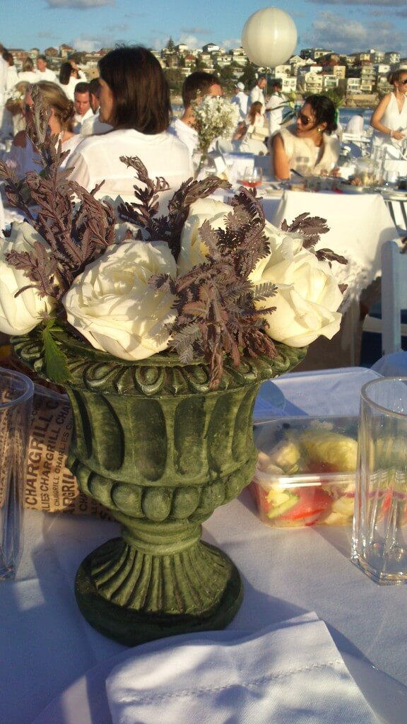 People lugged flowers and urns to decorate their table - there was a competition