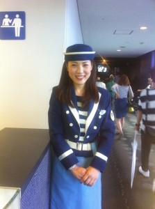 Cute uniforms (there's more photos like this of different women in different places - this one was at an Aquarium)