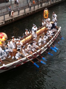 Dragon boating - incidentally as we passed over on a bridge.