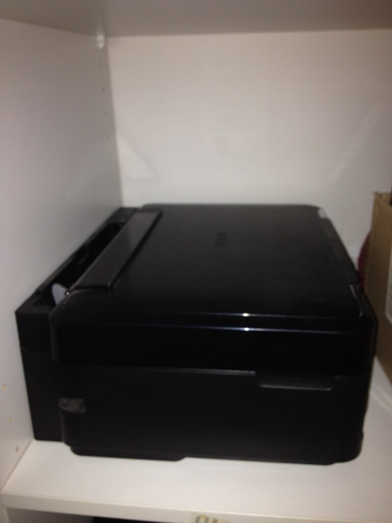 Not only is the printer int the cupboard, it has no driver to work on our computers. Oh and it's actually the BF's old flatmates!?